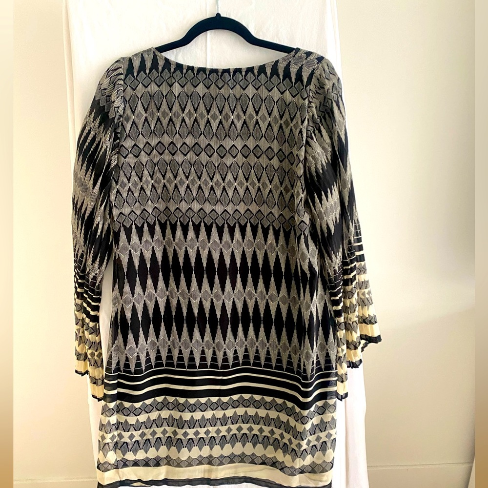 Black and biege chiffon flair sleeve mini dress by Fire Los Angeles.  Size L